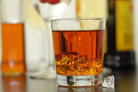 Dark liquor in a rocks glass